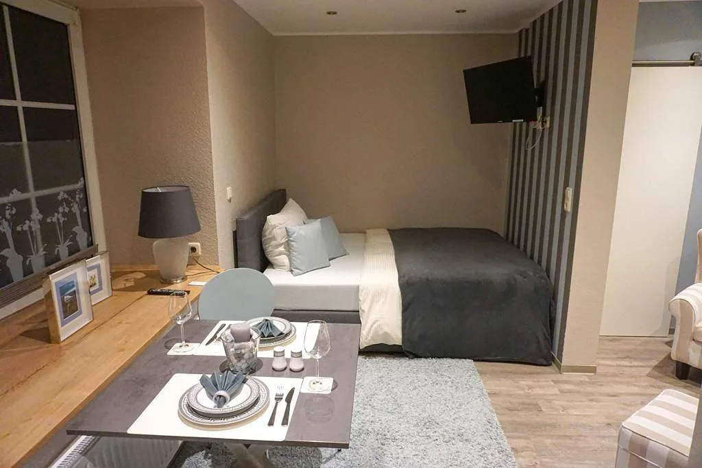 Burghaus 1 – Ferienwohnung in Grimersum