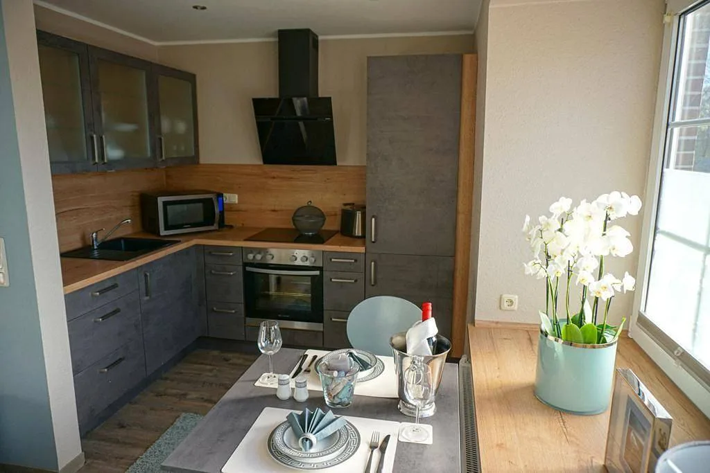 Burghaus 1 – Ferienwohnung in Grimersum
