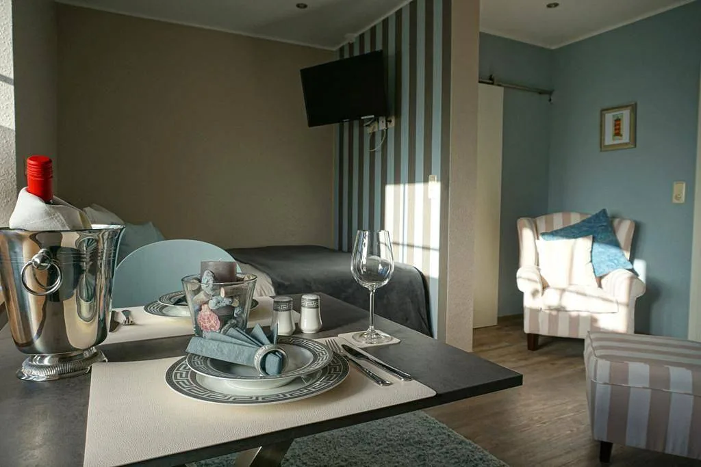 Burghaus 1 – Ferienwohnung in Grimersum